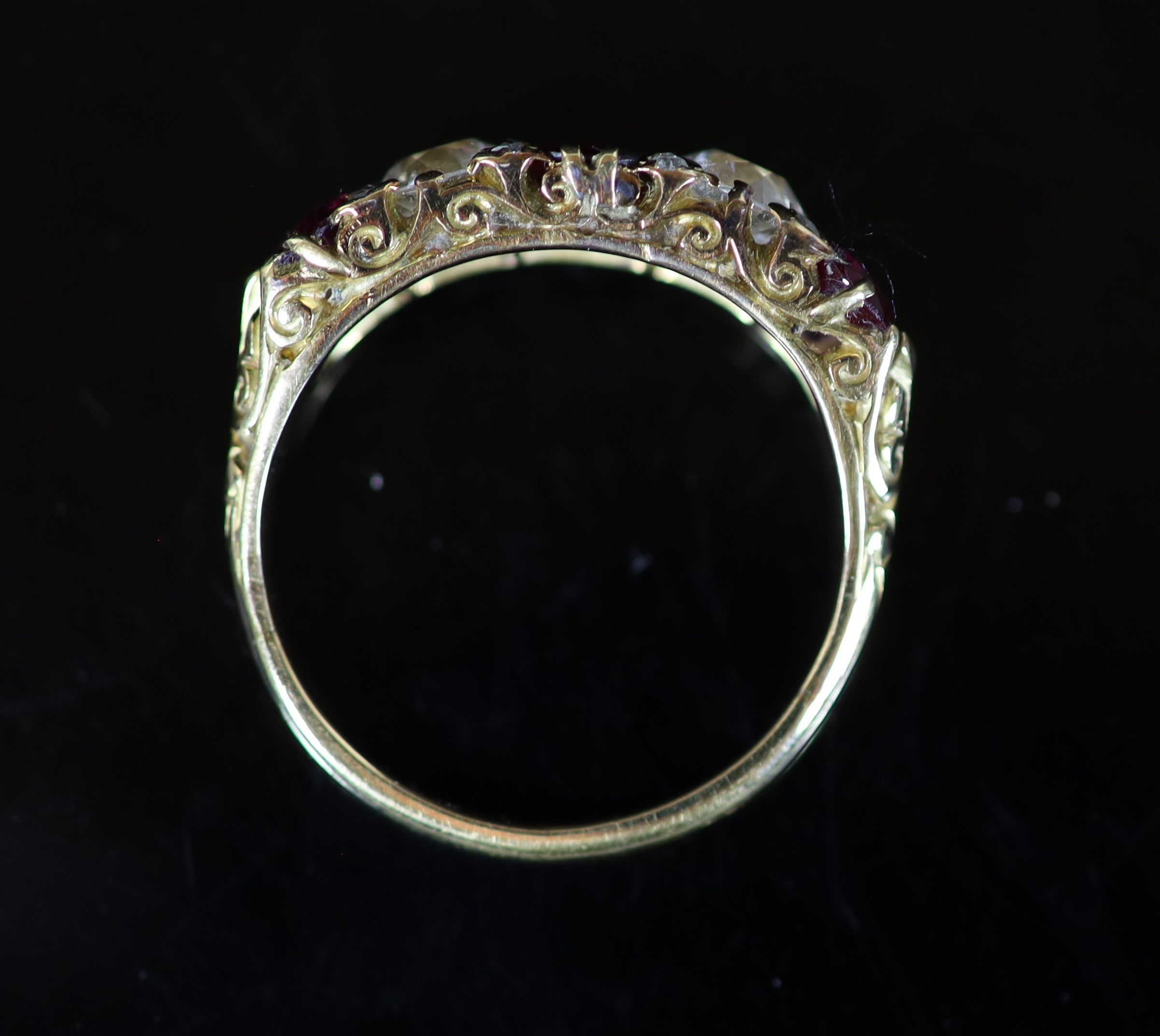 A Victorian style gold, three stone ruby and two stone diamond set half hoop ring